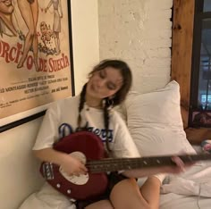 A Girl, A Woman, Guitar, Bed