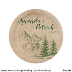 a round coaster with the words amanda and patrick on it, surrounded by pine trees