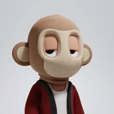 a cartoon monkey wearing a red jacket and white t - shirt with his eyes wide open