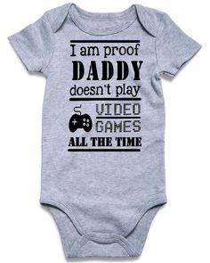 a baby bodysuit that says i am proof daddy doesn't play video games all the time