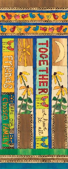 an art piece with words and flowers on the front, along with other items in it