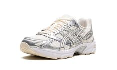 The Women’s ASICS Gel-1130 “Cream/Pure Silver” is a women’s-exclusive colorway of the lifestyle shoe with a versatile, easy-wearing design.  The ASICS Gel-1130 debuted in 2008 and is part of the Y2K sneaker trend inspired by retro running shoes made with mesh and synthetic leather.  On the “Cream/Pure Silver” colorway, the shoe features a white open mesh construction and metallic silver synthetic leather overlays accented with a cream hue.  “ASICS” and “Gel-1130” branding can be found on the mes Pink Asics, Converse Nike, Nike X Travis Scott, Popular Sneakers, Jordans Women, Jordan 2, Sneakers Adidas, Kids Uggs, Womens Jordans