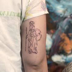 a person with a tattoo on their arm