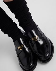 Upper with leather band Enameled metal triangle logo Monoblock rubber sole with hot-stamped logo Heel height, 20 mm Prada Loafers, Leather Loafers Women, Loafers Women, Ballerina Slippers, Custom Belt, Luggage Bags Travel, Large Wallet, Messenger Bag Backpack, Triangle Logo