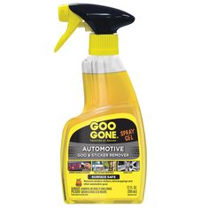 a bottle of goo gone automotive cleaner on a white background