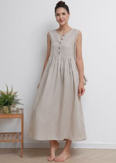 "Casual sleeveless button up dress with pleated skirt, suit daily at home/vacation/beach..etc. ★★FEATURES 100% Linen Two side pockets Front button closure Round neckline Sleeveless dress Pleated skirt Plus size dress Casual dress Mama dress Simple dress Perfect for Summer, Spring ★★ Model Size Height approx 162 cm (5′ 4″) Bust 84 cm (33\") Waist 66 cm (26\") She wears size XS. ★★ Bespoke Order Service If you Request other color Request the length Your height is not between 155 cm- 172 cm Your we Cotton Dress Summer Casual, Womens Linen Dress, Nigeria Dress, Pleated Skirt Plus Size, Home Dress Women, Dress With Pleated Skirt, Feminine Dresses, Linen Dress Summer, Sleeveless Cotton Dress