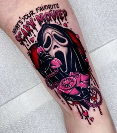 a person with a tattoo on their leg that says, what's your favorite scary movie?