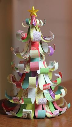 a christmas tree made out of strips of paper