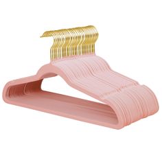 a pink and gold plastic hanger on a white background