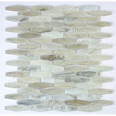 a white and grey mosaic tile wall