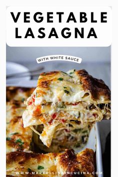 vegetable lasagna with white sauce in a casserole dish on a plate