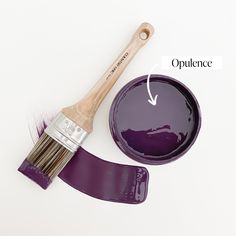 a paintbrush with purple hues next to it's bowl and brush labeled opulence