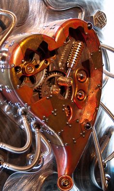 an image of a heart shaped clock made out of gears and metal parts with a poem written in the middle