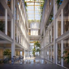 a bike is parked in the middle of an empty building with plants growing on it