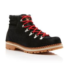 a pair of black boots with red laces