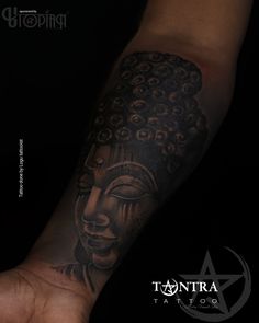 a person with a tattoo on their arm