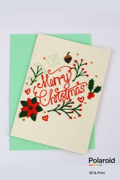 a christmas card with holly and berries on it