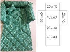 the size and measurements for a quilted blanket with green polka dot print on it