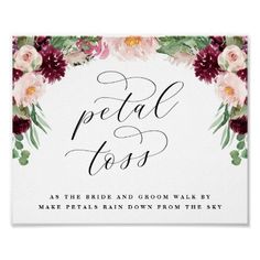 the floral wedding sign is shown in white with burgundy flowers and greenery on it