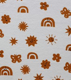 an orange and white background with different designs on it