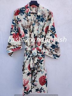 ITEM DESCRIPTION: These Cotton Floral Print Robes are luxurious and sweet, and will make you and your bridesmaids feel like you're blossoming flowers ! These robes are perfect for bridesmaids gifts, birthday gifts, and perfect gifts for girls who are in college. A beautiful lightweight cotton kimono-style hand-printed dressing gown. The gown is 100 cms length and 120 cms wide / bust approx. Features two front pockets, belt and loops. This soft cotton fabric is from India. Fabric has soft touch. India Fabric, Kimono Floral, Floral Print Kimono, Bath Robes, House Coat, Robes For Women, Kimono Robes, Printed Robe, Cotton Kimono