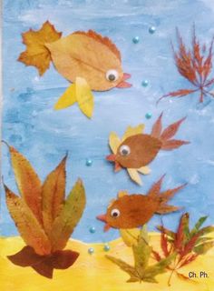 an art project with leaves and fish in the water