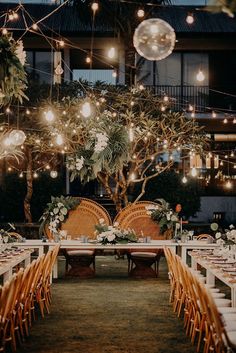 an outdoor venue with tables and chairs set up for a wedding reception at the resort