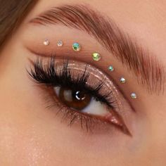 Our famous OG crème-to-powder formula delivers supercharged sparkling colour with minimal creasing, fading or fallout. One swipe of this long-lasting shadow is all you need to get high impact colour! Its unique bouncy texture is super creamy and insanely pigmented to take any look to the next level. Glitter Eye Makeup Festival Sparkle, Rave Eye Makeup Rhinestones, Sparkly Inner Corner Eye, Diamond Makeup Looks Euphoria, Gold Glitter Eye Makeup Festival, Gem Makeup, Rhinestone Makeup, Waterproof Gel Eyeliner, Creamy Eyeshadow