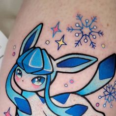 a tattoo with a blue and white design on it