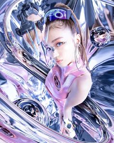 a woman is standing in the reflection of a shiny car wheel with her headphones on