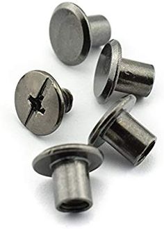 four metal screws with one hole in the middle