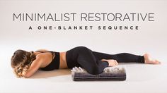 a woman laying on the ground with her back to the camera and text that reads minimalist restorative a one - blanket sequence