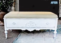 a white bench sitting on top of a tiled floor next to a dresser and mirror