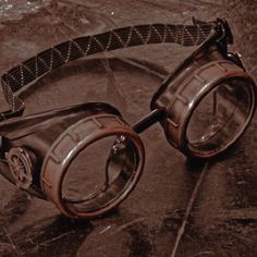 a pair of goggles laying on the ground