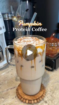 pumpkin protein protein drink in a glass on top of a counter