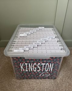 a plastic storage box filled with lots of files