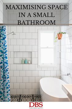 a bathroom with blue and white tile on the floor, shower curtain, tub and window