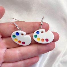 These cute paint palette earrings are made using nickel free and hypoallergenic earring hooks! Paint Palette Earrings, Artistic White Resin Earrings, Artistic White Drop Earrings, Novelty Multicolor Earrings With Ear Wire, Artsy White Resin Earrings, Artistic White Nickel-free Earrings, Artistic White Round Earrings, Artistic Hand Painted White Earrings, Fun Nickel-free White Earrings