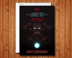 a card with the words you light up my heart and an image of iron man