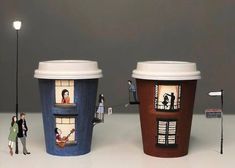 three coffee cups with people standing outside the windows