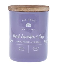 a purple candle with a wooden lid