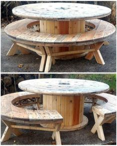 the table is made out of wooden boards and has benches around it for seats to sit on