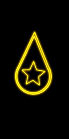 a yellow neon sign with a star in the center on a black background that is lit up