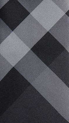 a black and white checkered tie is shown in close up view on the necktie