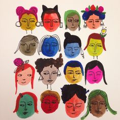 a group of different colored faces on a white paper with words written in the middle