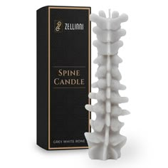 a candle that is in front of a box