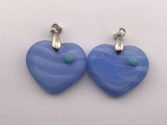 These Czech glass heart-shaped pendants are so beautiful that they make me weak in the knees.  Each one has satiny swirls of periwinkle blue and has a turquoise rhinestone.  29 x 24 mm To shop for vintage costume jewelry from my 20-year collection, visit my Etsy store RNEVE: http://www.etsy.com/shop/rneve I have completely revamped my Etsy store, RLNjewelry, that features my artisan made jewelry! Visit it now!  New price structure!  http://www.etsy.com/shop/rlnjewelry I have spent years searchin Weak In The Knees, Made Jewelry, Periwinkle Blue, Glass Heart, Vintage Costume Jewelry, Vintage Costumes, Cut And Color, Glass Pendants, Czech Glass