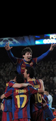 barcelona's players celebrate after winning the spanish league