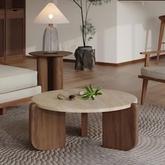 a living room scene with focus on the coffee table and two chairs in the background