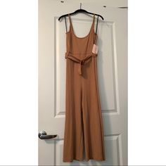 Brand New With Tags Missguided Tan Rib Belted Culotte Jumpsuit With Fully Adjustable Straps And Belt Size 10 Fits A M/L Has Stretch To It Ankle Length Jumpsuit Chic Brown Jumpsuits And Rompers For Loungewear, Fitted Solid Jumpsuits And Rompers With Tie Waist, Fitted Jumpsuits And Rompers With Tie Waist, Fitted Brown Overall Jumpsuit, Fitted Brown Jumpsuit, Lace Playsuit, Bell Sleeve Romper, Cami Romper, Boho Romper